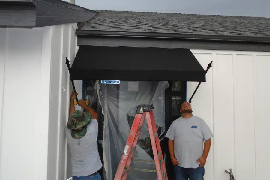black awning installation