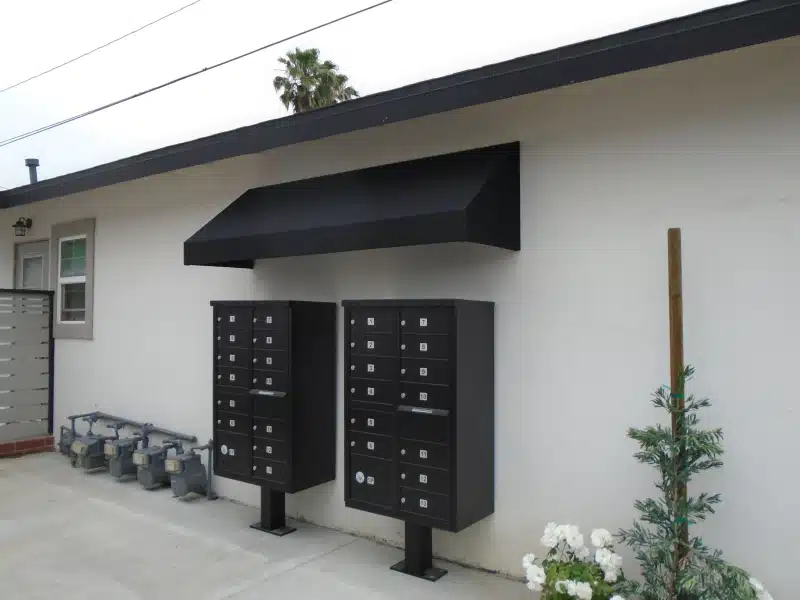 black awning installed in a mail section of a commercial property buena park ca